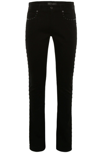 Shop Versace Studded Straight Jeans In Black