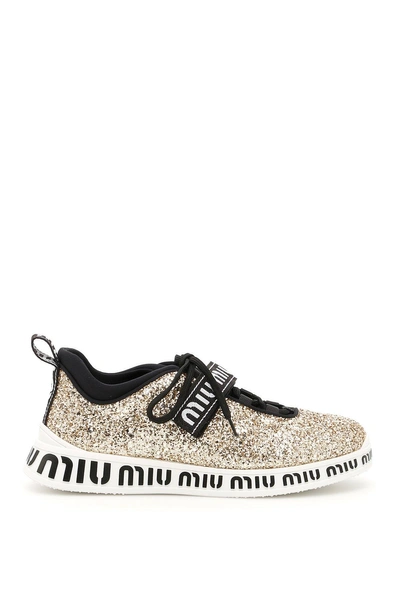 Shop Miu Miu Glitter Sneakers In Gold