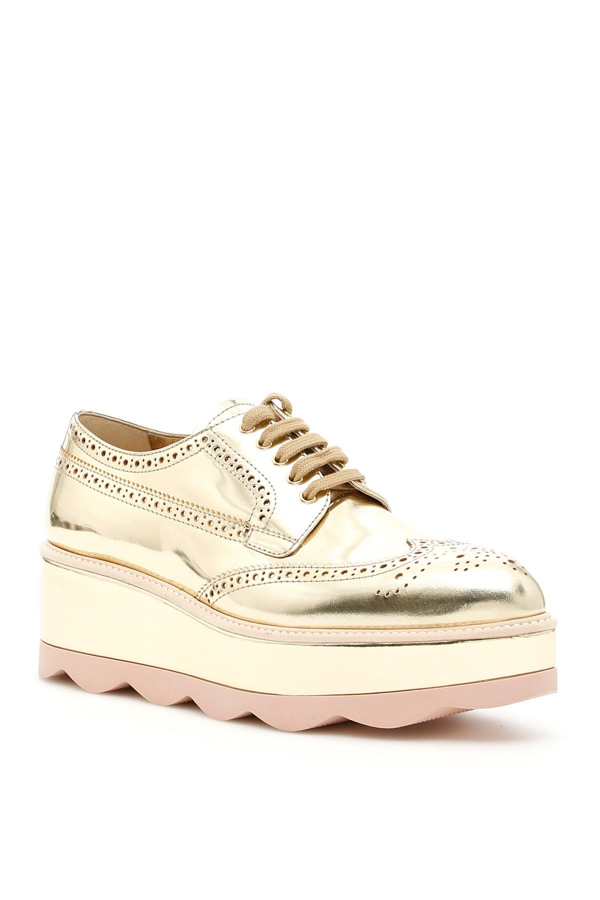 Prada Metallic Platform Derby Shoes In Gold | ModeSens