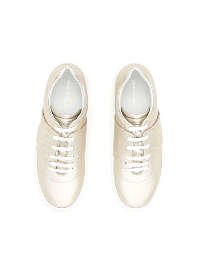 Shop Ferragamo Calfskin Fasano Sneakers In Sahara (metallic)