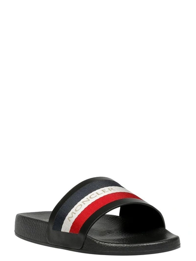 Shop Moncler A Porter Striped Sliders In 999