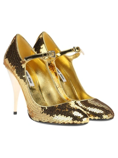 Shop Miu Miu Mary Jane In Gold