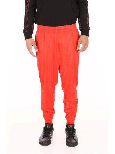 Shop Adidas Originals By Alexander Wang Joggers In Corred Black (red)