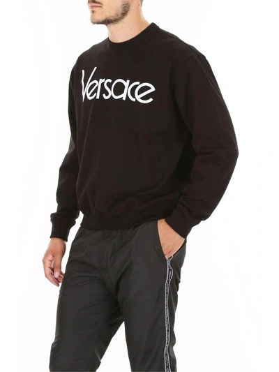 Shop Versace Logo Sweatshirt In Nero Bianconero