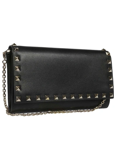 Shop Valentino Rockstud Clutch In 0no Black