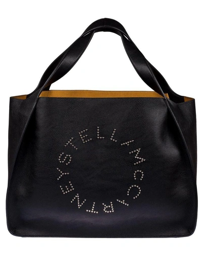 Shop Stella Mccartney Studded Logo Tote In Black
