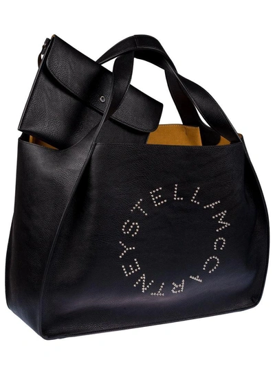 Shop Stella Mccartney Studded Logo Tote In Black