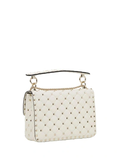 Shop Valentino Rockstud Medium Handbag In Panna