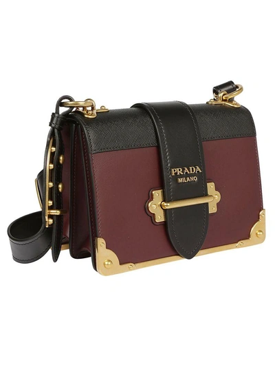 Shop Prada Cahier Shoulder Bag In Granato + Nero