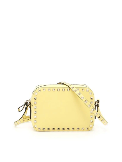 Shop Valentino Rockstud Crossbody Bag In Jonquille