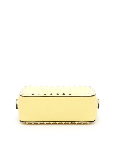 Shop Valentino Rockstud Crossbody Bag In Jonquille