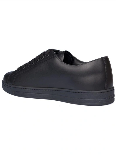 Shop Prada Low Top Logo Sneakers In Nero