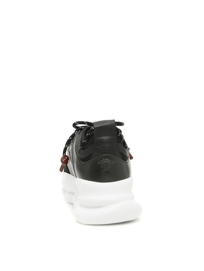 Shop Versace Chain Reaction Sneakers In Black White