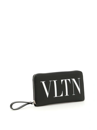Shop Valentino Vltn Zip-around Wallet In Nero Bianco