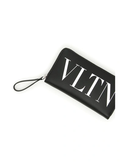 Shop Valentino Vltn Zip-around Wallet In Nero Bianco
