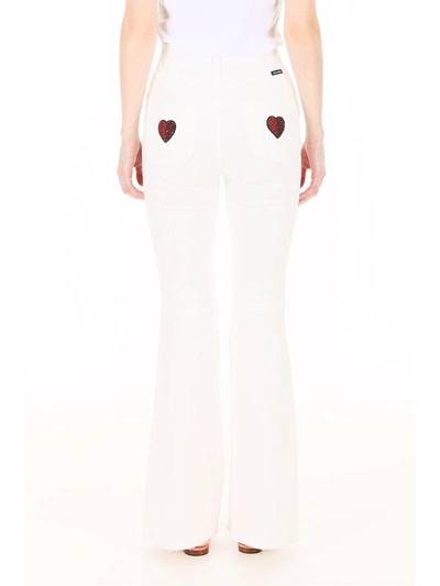 Shop Dolce & Gabbana Flare Jeans With Princess Patch In Bianco Ottico (white)