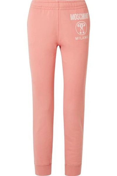 Shop Moschino Printed Cotton-jersey Track Pants In Coral