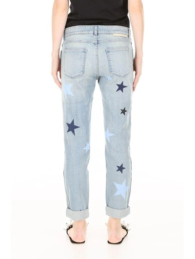 Shop Stella Mccartney Star Print Jeans In Light Blue (blue)