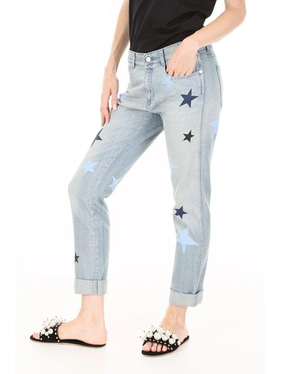 Shop Stella Mccartney Star Print Jeans In Light Blue (blue)