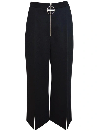 Shop Givenchy Wide Cut Trousers In Black