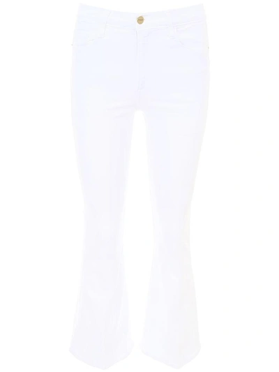 Shop Frame Le Crop Flare Jeans In Blanc (white)