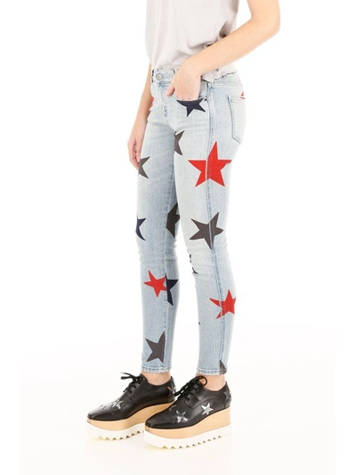 Shop Stella Mccartney Star Print Jeans In Classic Blue