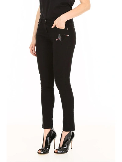 Shop Valentino Jeans With Heart Patch In Nero Denim (black)