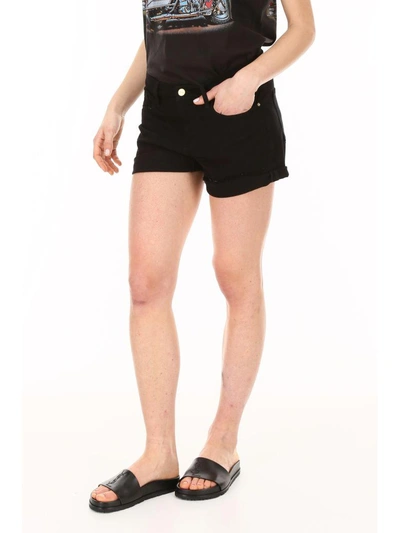 Shop Frame Le Cutoff Shorts In Noir (black)