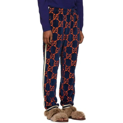 Gucci Logo-print Devore-velvet Track Pants In Navy | ModeSens