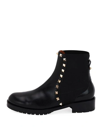 Shop Valentino Rockstud Leather Boot, Black In Nero