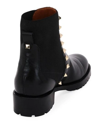 Shop Valentino Rockstud Leather Boot, Black In Nero