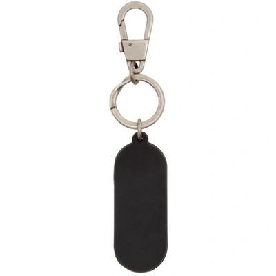 Shop Gucci Black And Yellow Rubber Logo Keychain In 8878 Bk/ylw