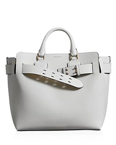 Shop Burberry Medium Belt Leather Tote In Chalk White/gold