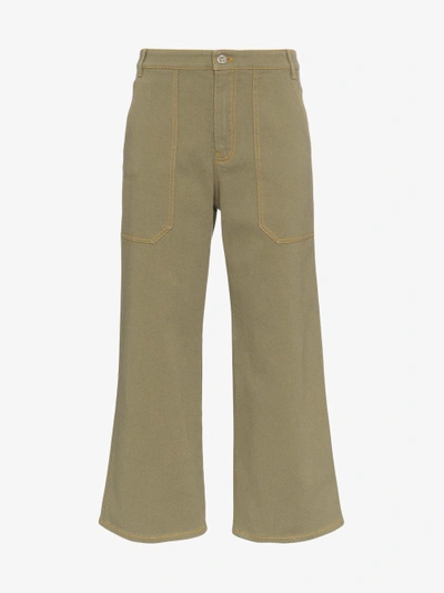 Shop Miu Miu Mid Rise Studded Cropped Wide-leg Jeans In Green