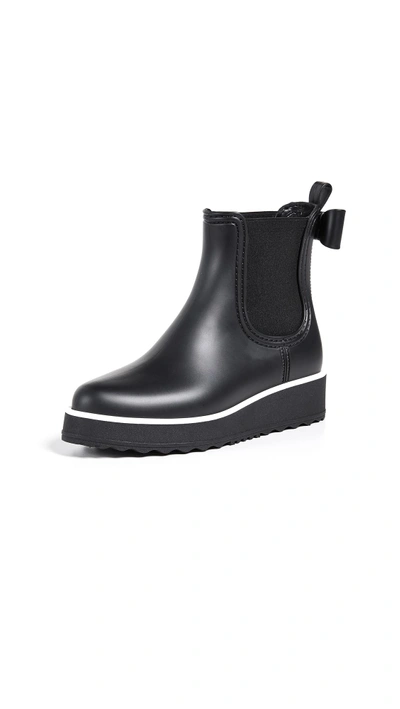 Shop Kate Spade Malcom Rain Booties In Black