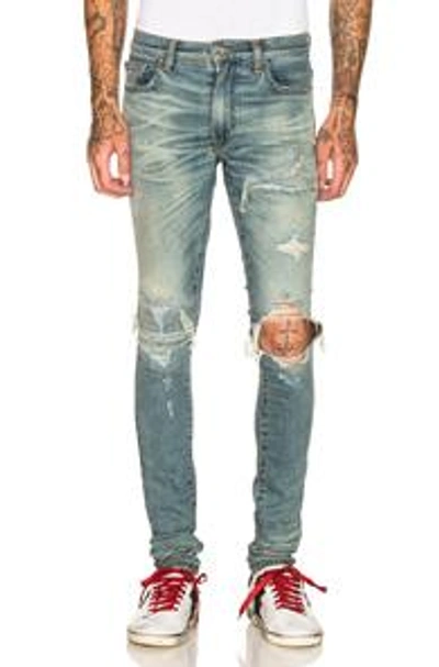 Shop Amiri Mx1 Denim Patch Broken Jean In Blue