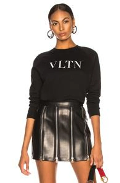 Shop Valentino Vltn Faded Cotton Sweatshirt In Black.