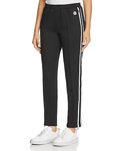 Shop Moncler Striped Trousers In Black