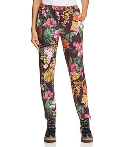 Shop Moncler Floral Print Trousers In Burgundy