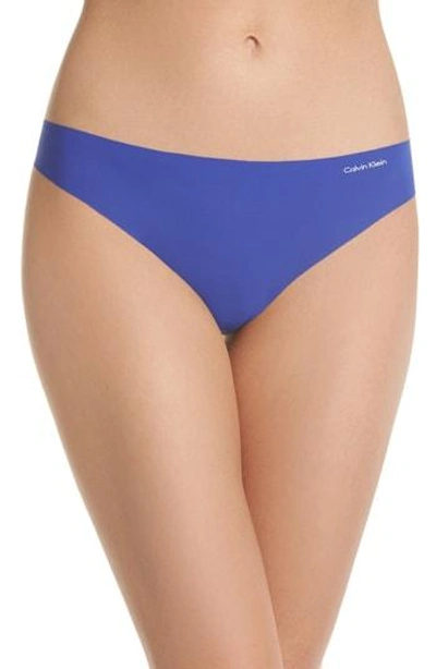 Shop Calvin Klein 'invisibles' Thong In Pure Cerulean