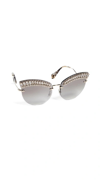 Shop Miu Miu Crystal Cat Eye Sunglasses In Gold/grey Mirror