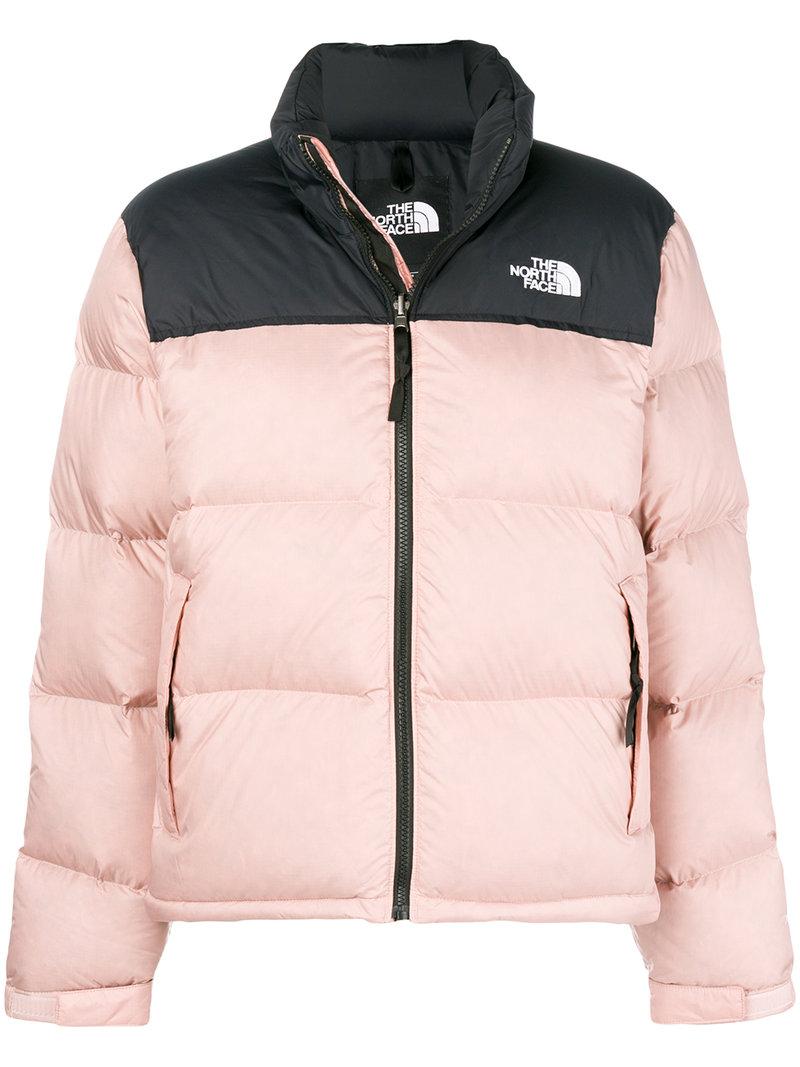 pink and black north face jacket
