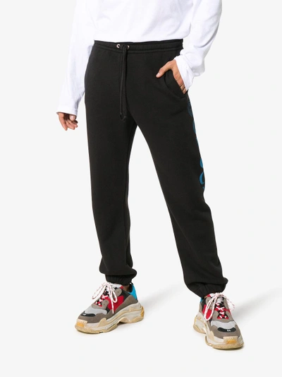 Shop Gucci Gg Logo Print Cotton Sweatpants In Black