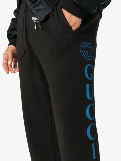 Shop Gucci Gg Logo Print Cotton Sweatpants In Black