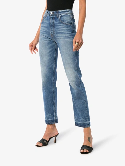 Shop Reformation Cynthia Distressed Jeans In Blue