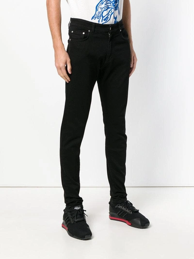 Shop Represent Essential Slim-fit Jeans - Black