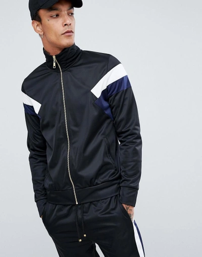 Shop Criminal Damage Track Jacket In Black With Blue Side Stripe