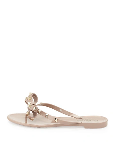 Shop Valentino Rockstud Pvc Flat Thong Sandals In Poudre