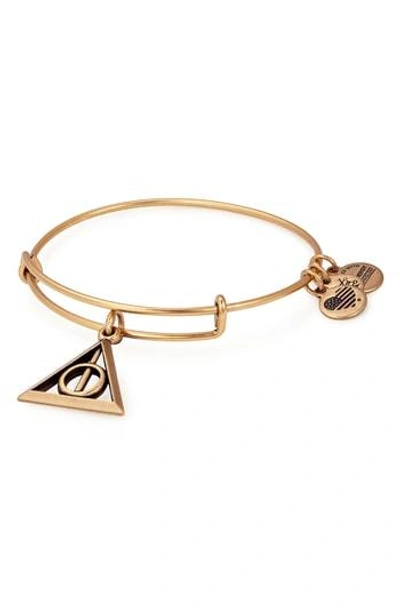 Shop Alex And Ani Harry Potter(tm) Deathly Hallows(tm) Adjustable Wire Bangle In Gold