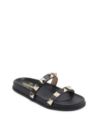 Shop Valentino Lock Leather Slides In Black